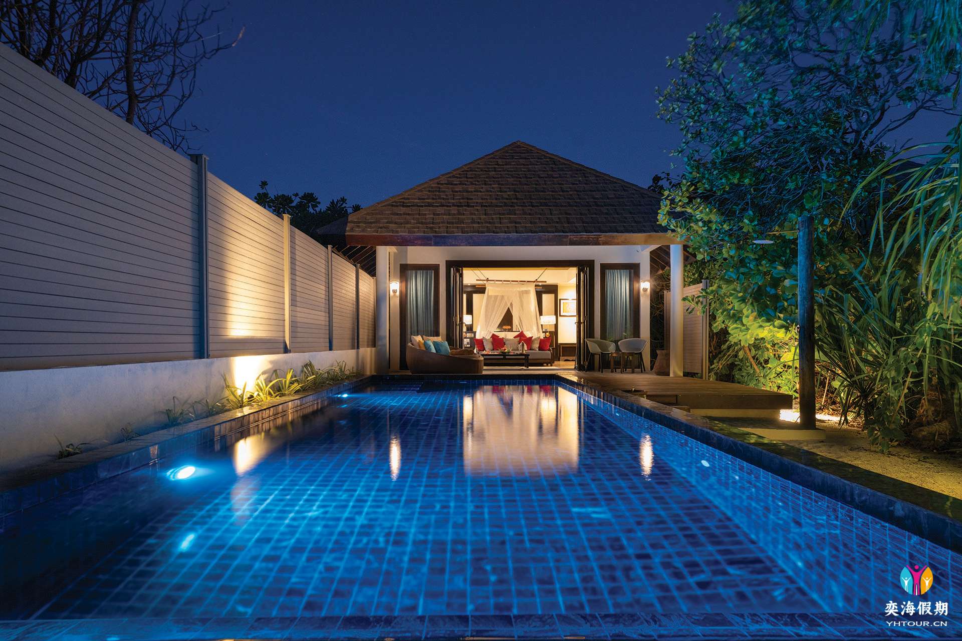 ATMOSPHERE KANIFUSHI MALDIVES - KANIFUSHI BEACH VILLA WITH POOL - EXTERIOR VIEW FRONT - SUNSET 1.jpg