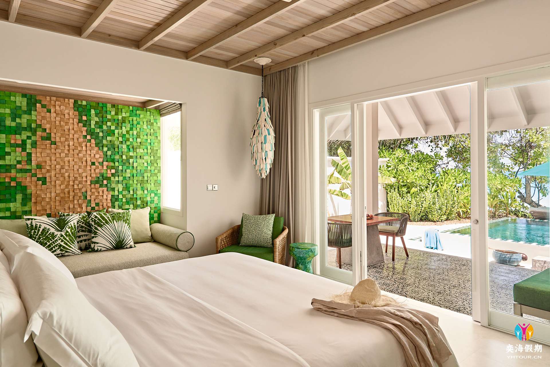 2103_Finolhu Maldives_Beach Pool Villa - Bedroom and acccent wall.jpg