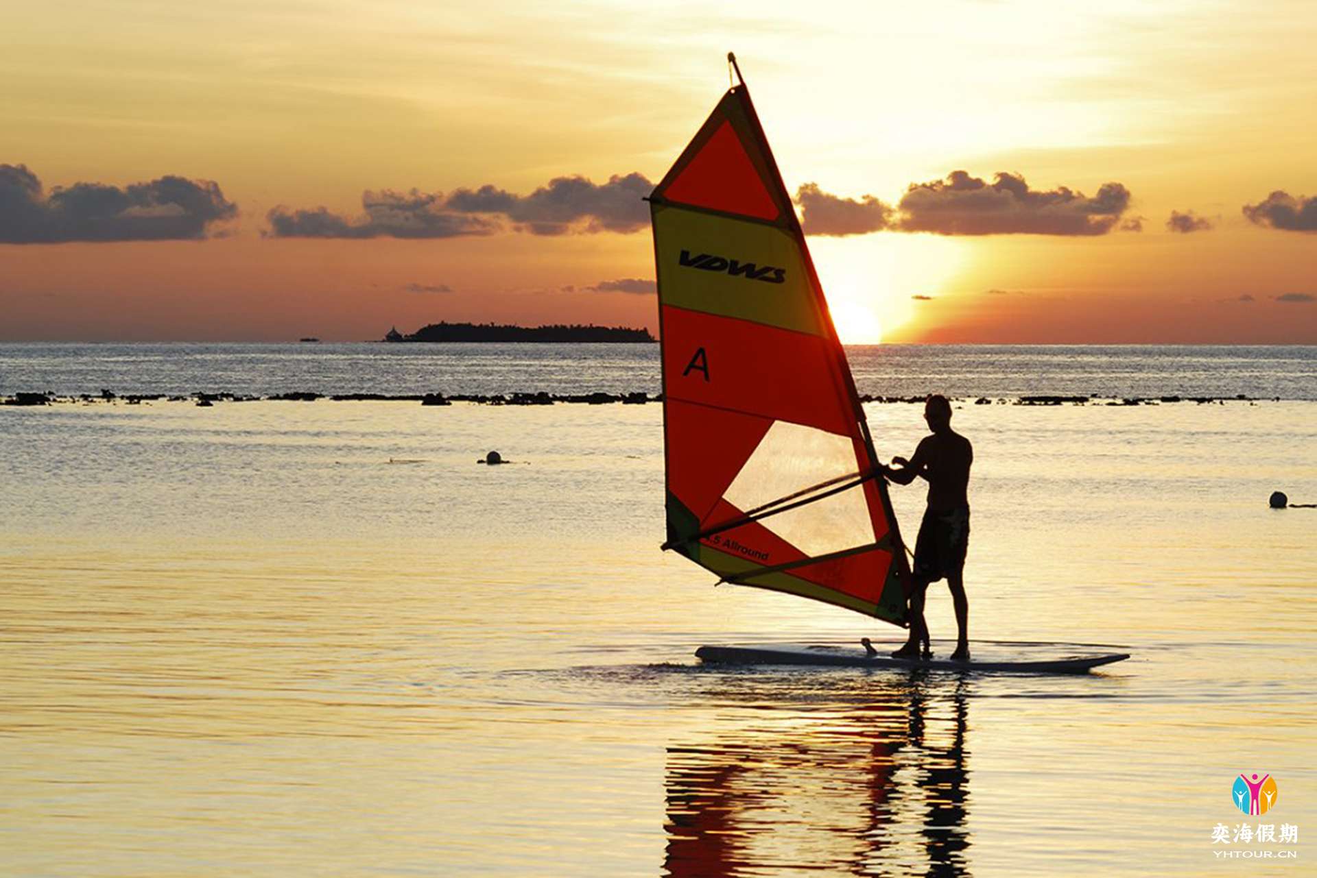 maldivesthulhagiriislandresortsportsandrecreation_windsurfingatsunset.jpg