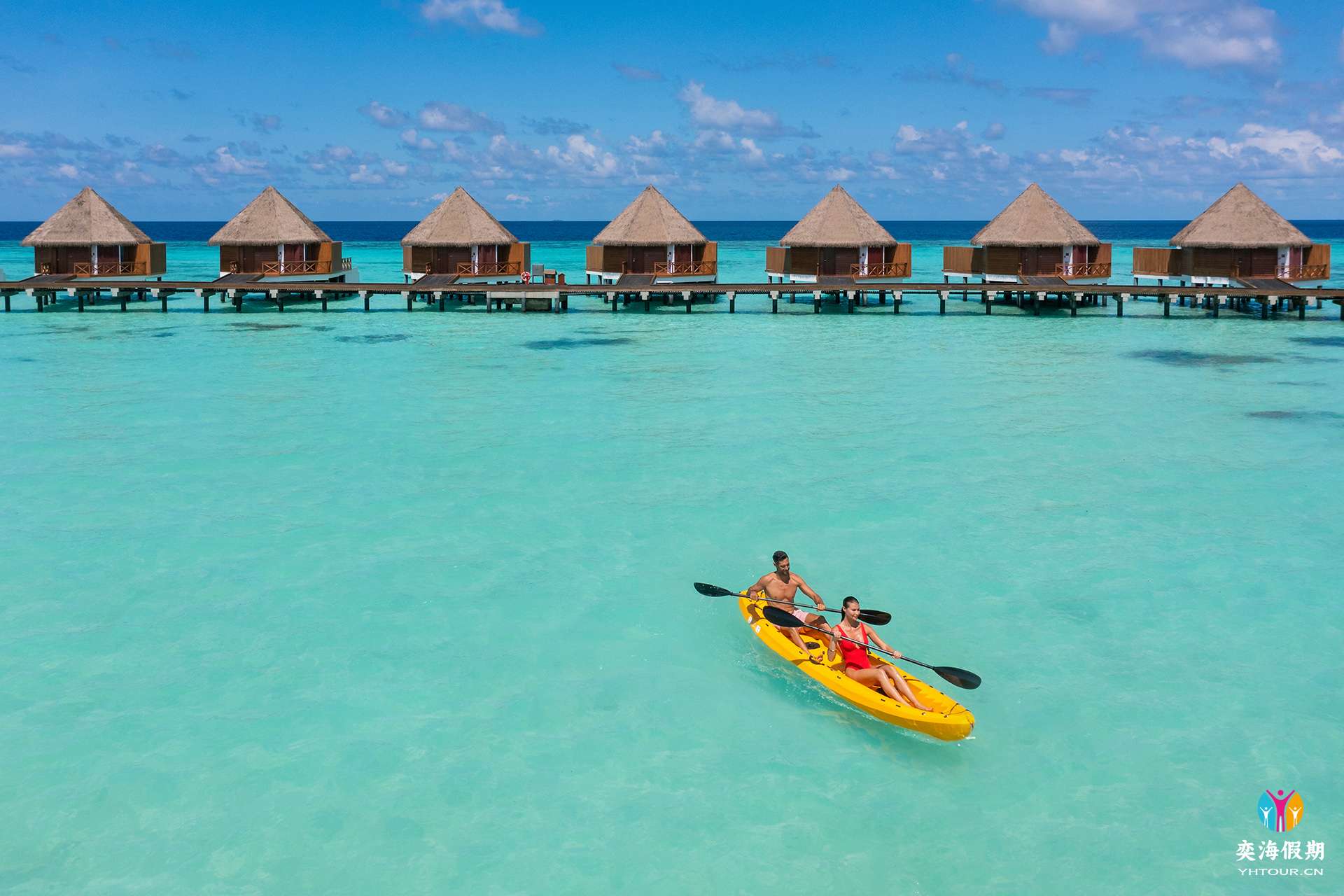 water sports  Couple on Kayak near Overwater Villas.jpg