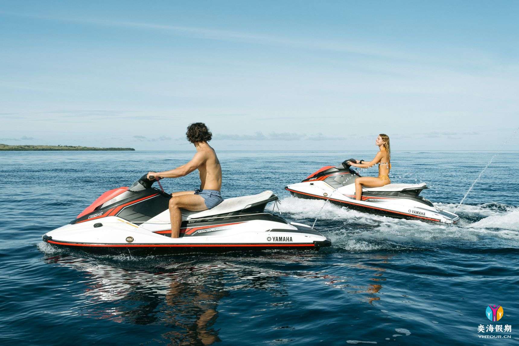 A man and woman on separate jet skis in_yyth.jpg