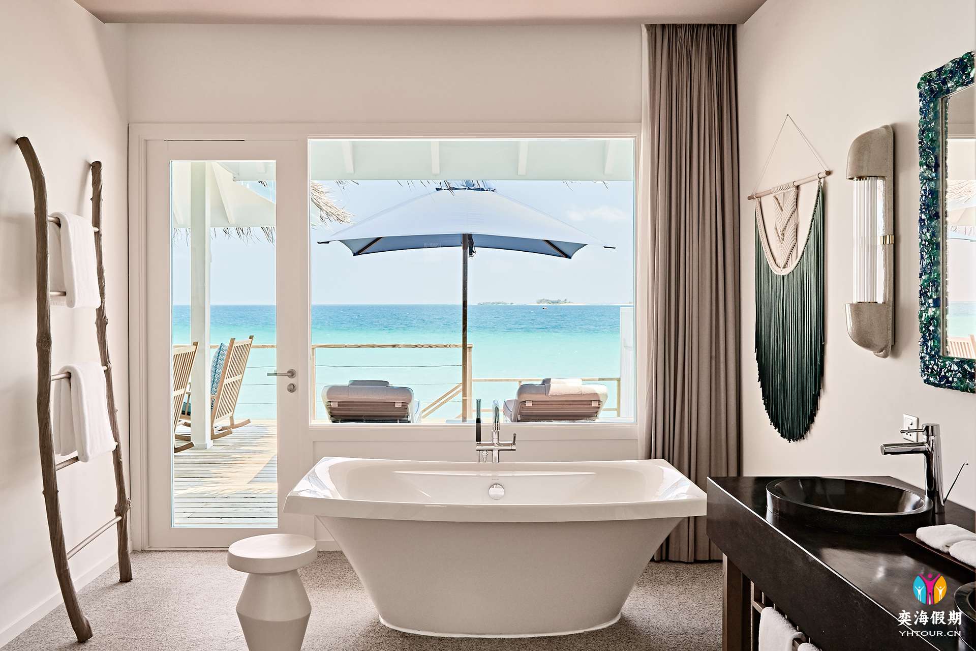 2103_Finolhu Maldives_Lagoon Villa - Bath with lagoon view.jpg