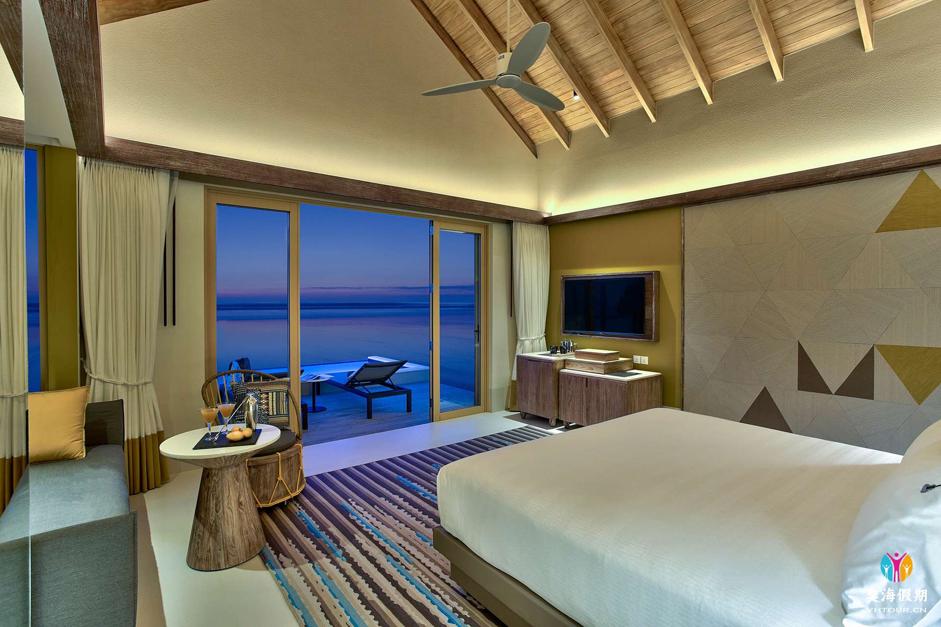 Platinum Overwater Pool Villa_bedroom_evening.jpg